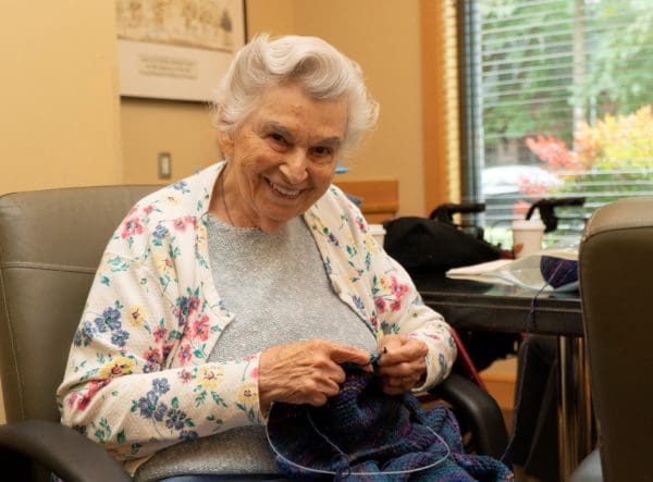 Senior woman enjoying a knitting session