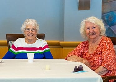 Smiling ladies at the Mary Schwartz Summit in Seattle