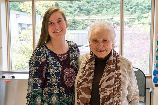 Granddaughter smiling with her grandmother at Kline Galland Home, a long-term skilled nursing facility in Seattle