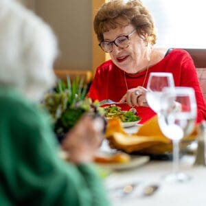 Woman enjoying dinner at Mary Schwartz