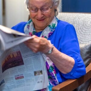 Woman reading a newspaper